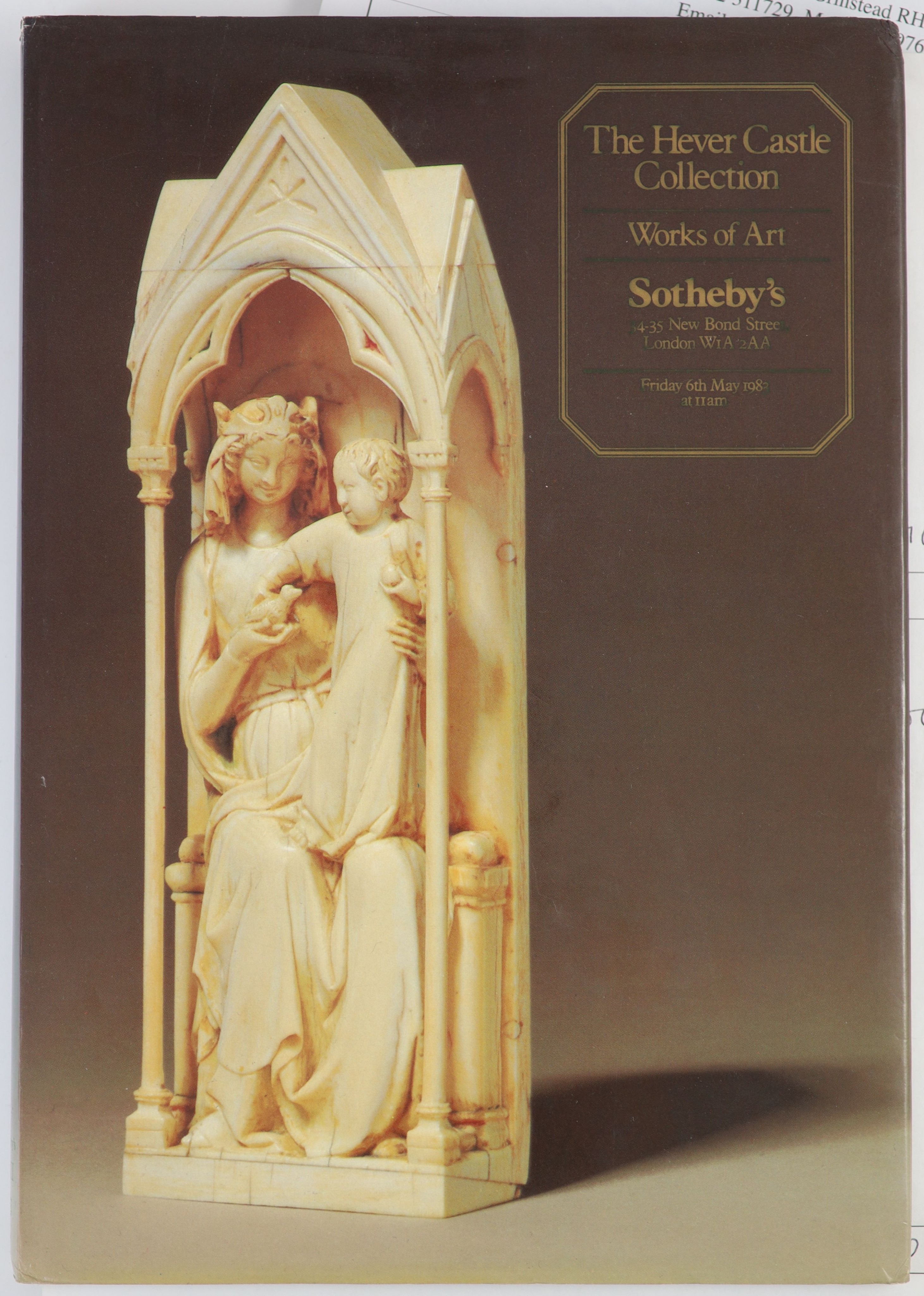 A 17th century French ivory group of a mother and child Height overall 14.5cm.